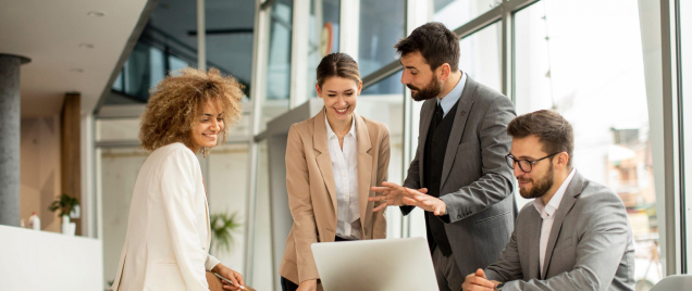 Group of business people talking at table