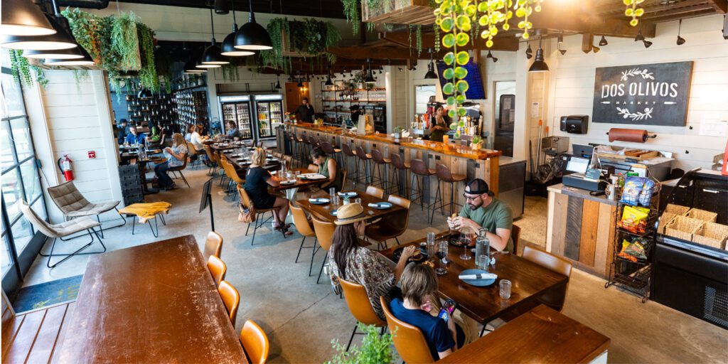 Dos Olivos dining area with customers eating