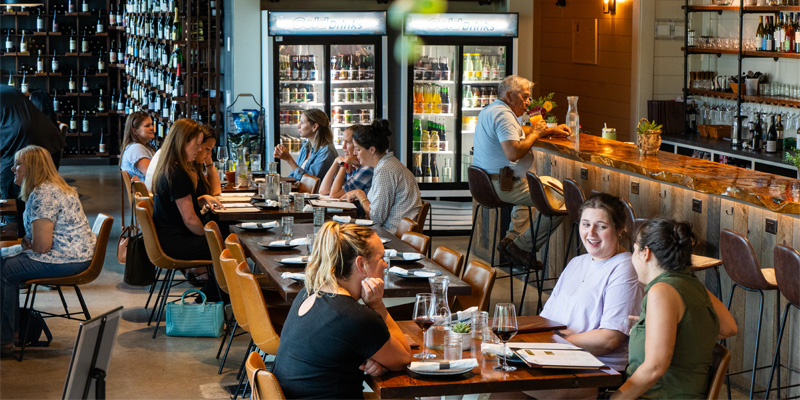 Dos Olivos dining area with customers eating