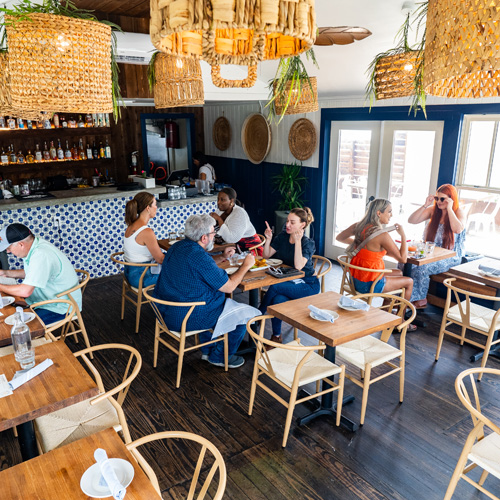 People dining at MaCoCo restaurant