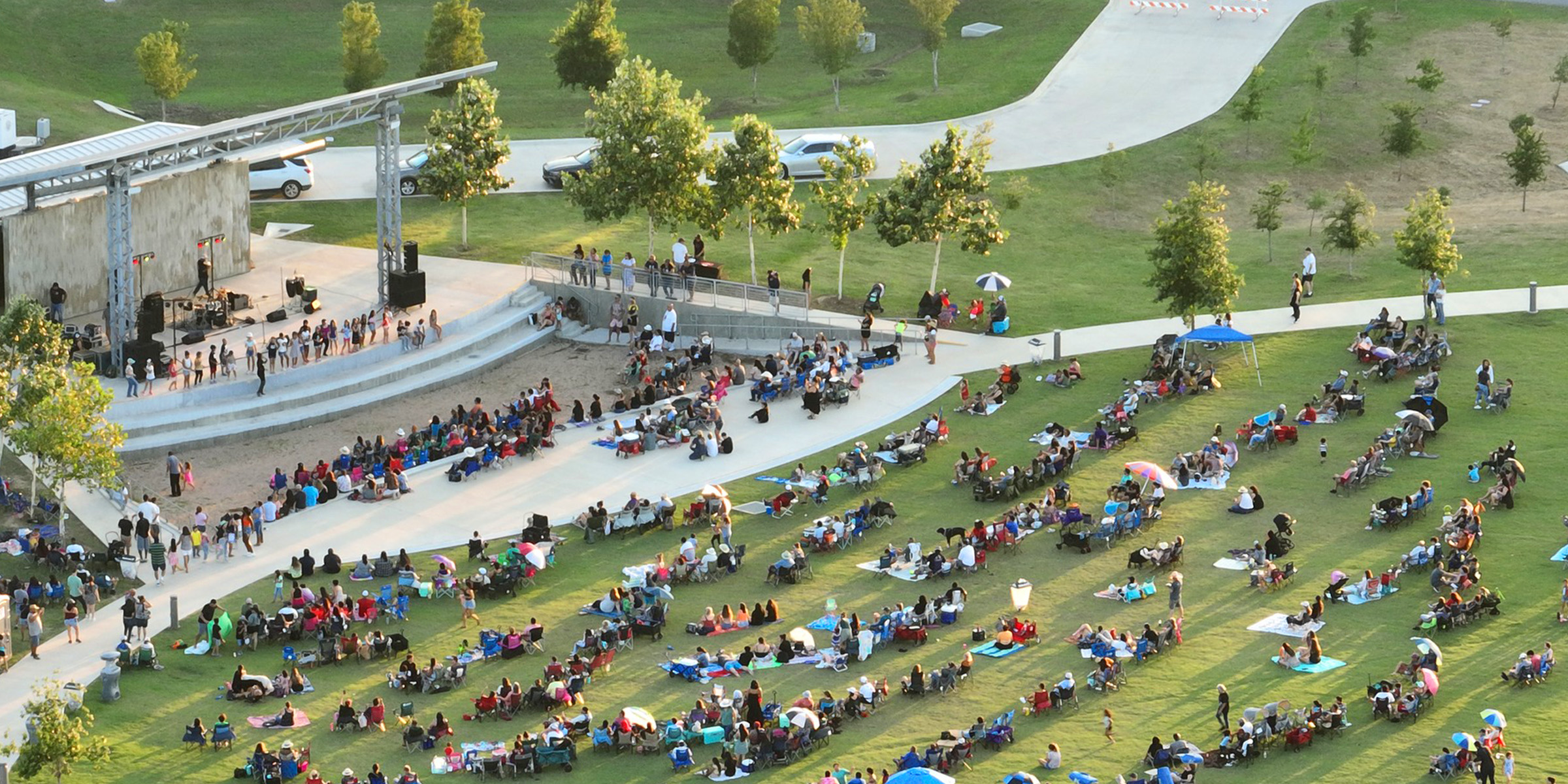 Aerial of Buda Amphitheater & City Park with concert attendees