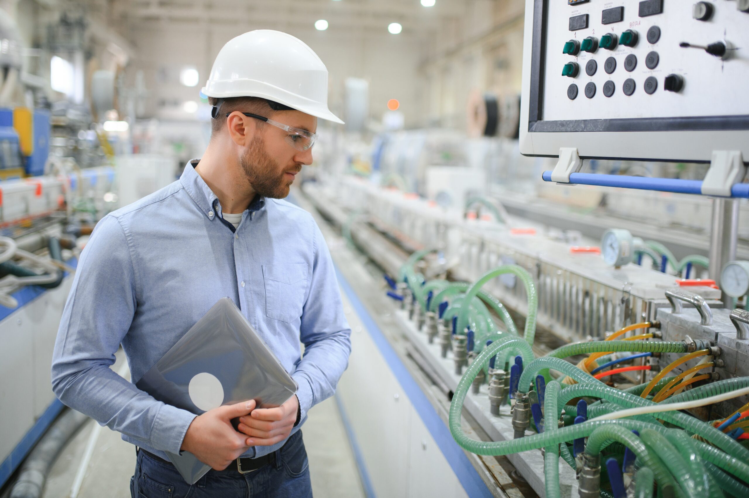 Engineer looking at machinery